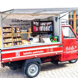 butietta-pontresina-mit-piaggio-ape-am-sommermarkt